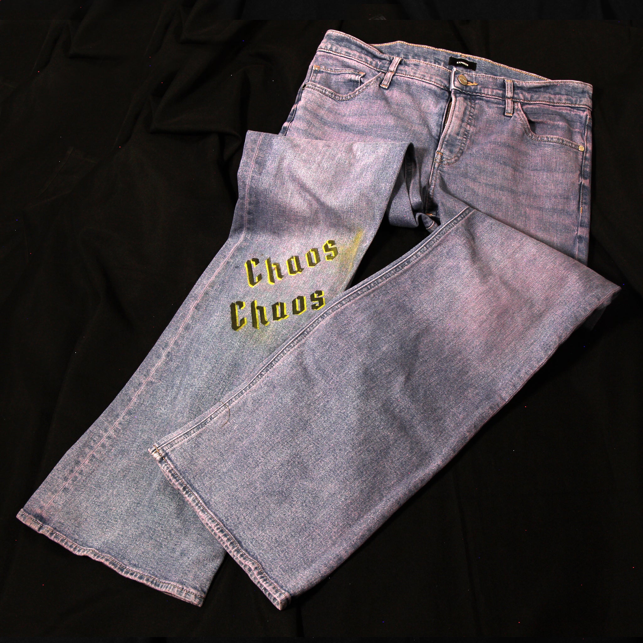Purple Dyed Express Denim Jeans with Spray Painted "Chaos" stencil